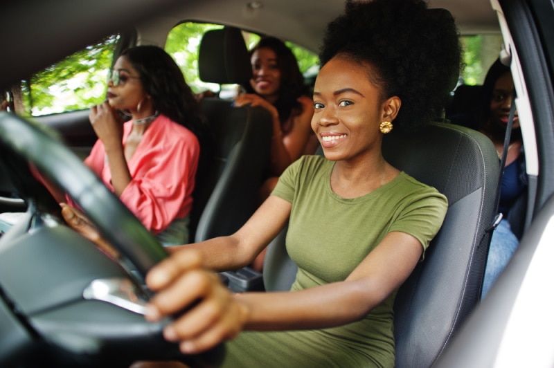 Four women riding in a car