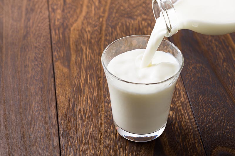 Pouring milk into glass
