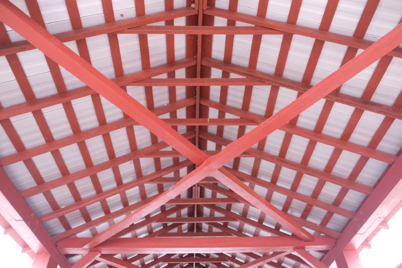 Queen truss post bridge with metal roof