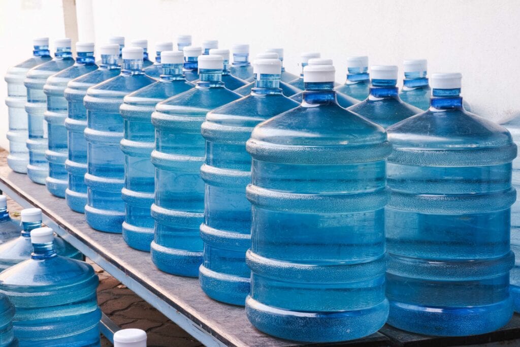 Rows of Big Bottle of Drinking Water Supply