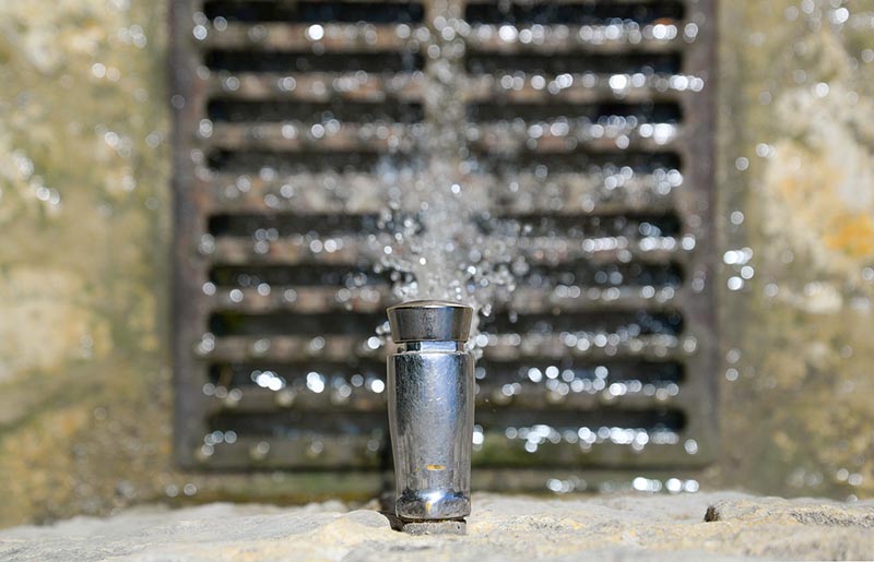 Running water down the drain