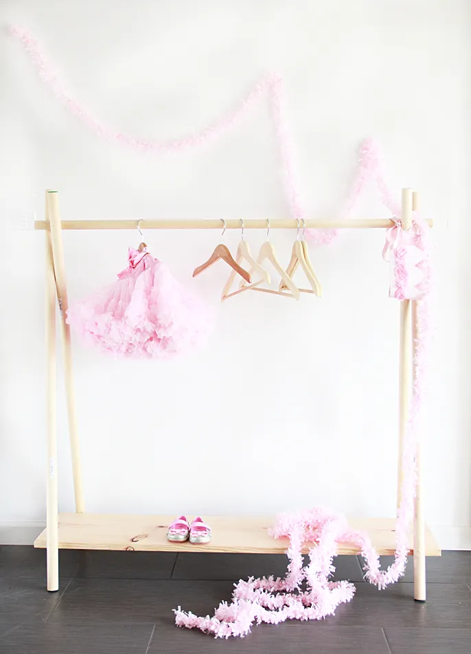 Rustic Dowel Storage Rack by A Bubbly Life