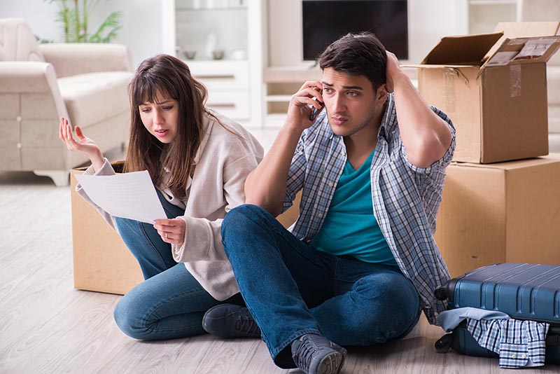 Young couple receiving foreclosure notice letter