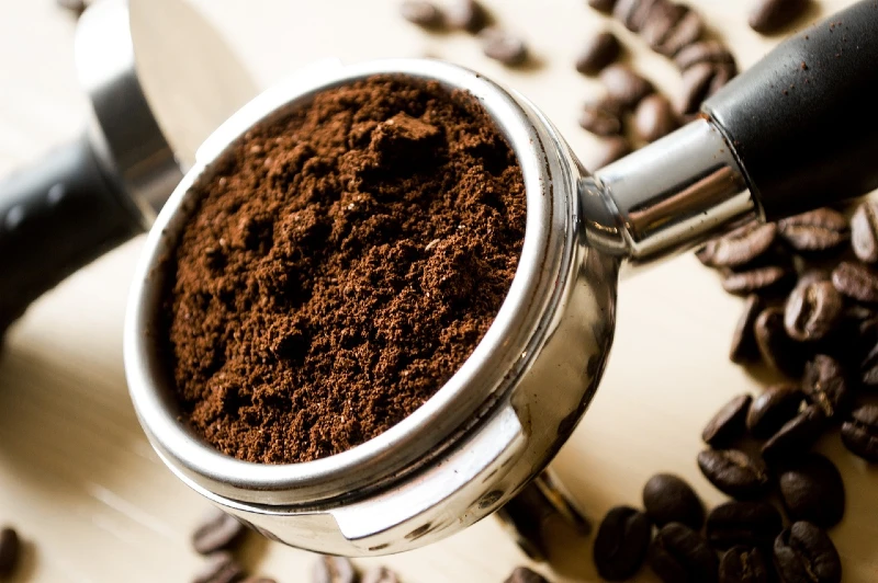 ground coffee in a portafilter