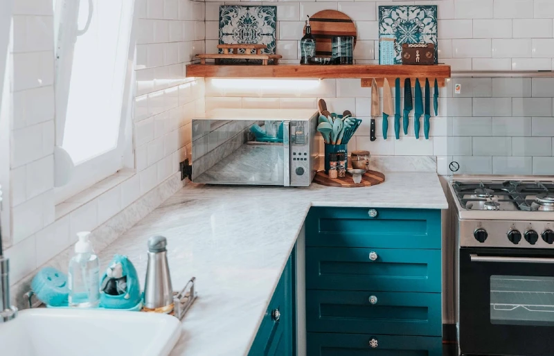 kitchen counter with a microwave