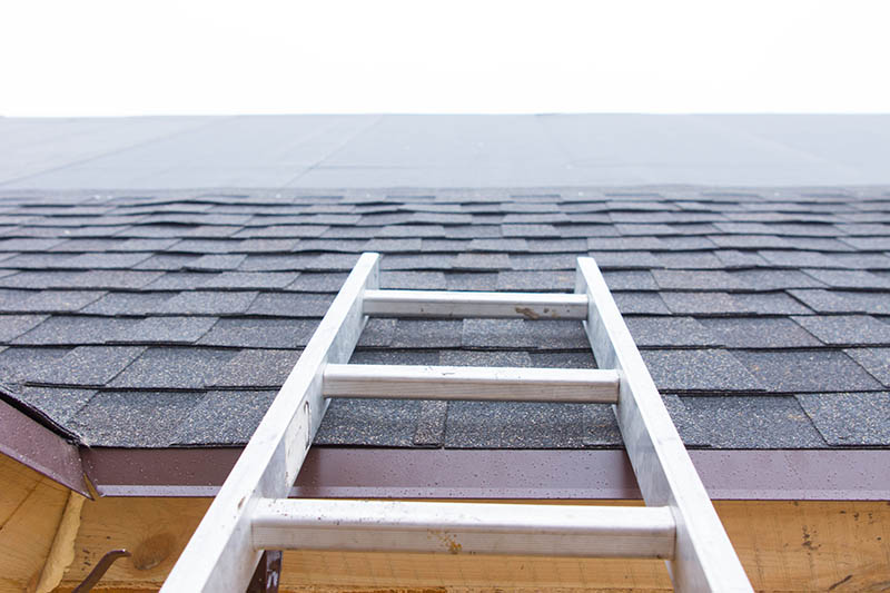 ladder on sloped roof