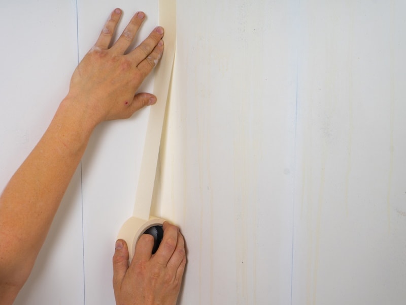 man using adhesive tape