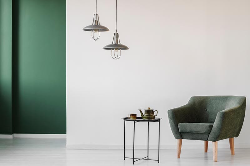 minimalist living room interior with a green corner