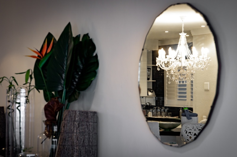oval mirror in the wall