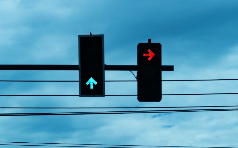 red and green arrows on traffic lights
