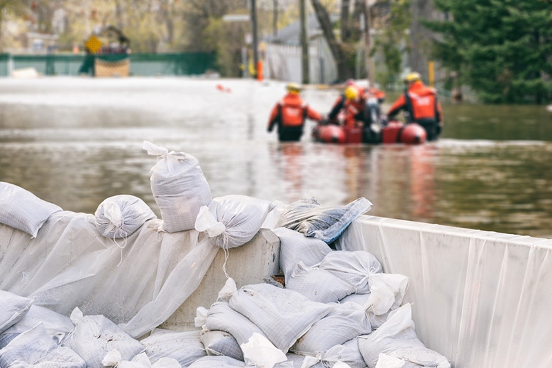 rescue team at flooded residential area