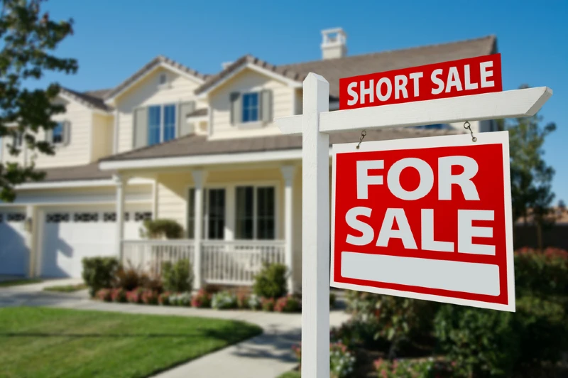 short sale home for sale real estate sign