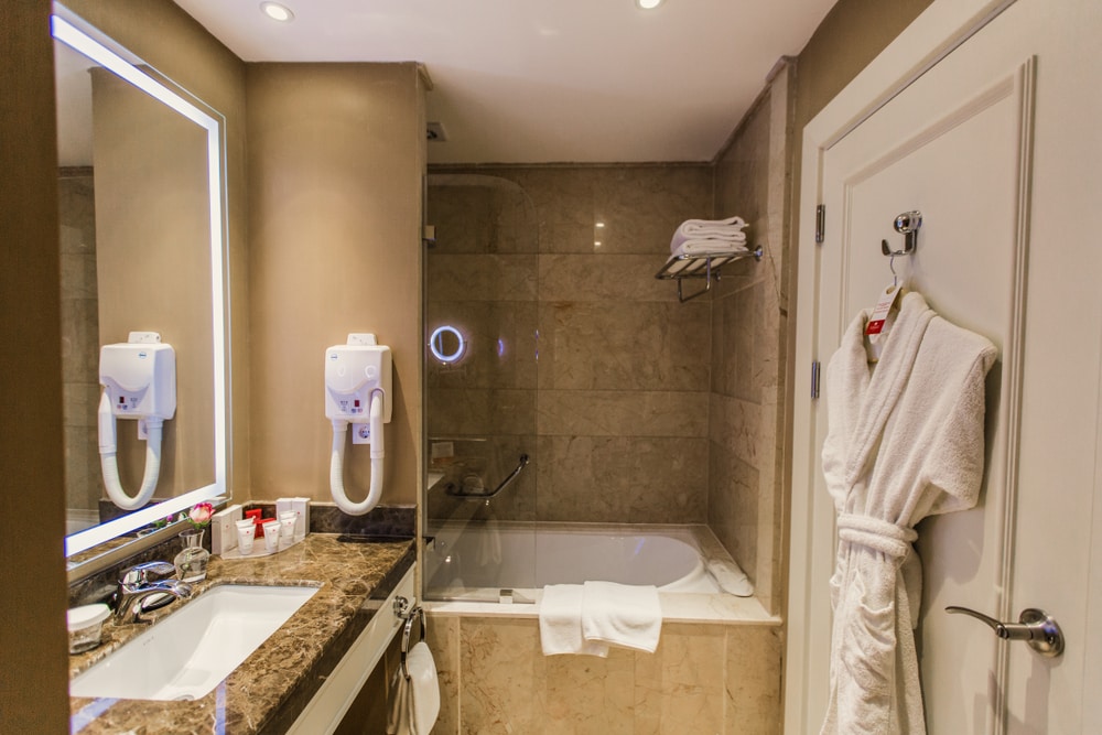 Shower,,Bathroom,In,The,Hotel,-,Bathroom,Accessories,,Hairdryer,,Mirror