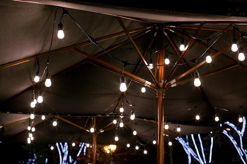 string lights under sunshade