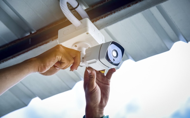 technician installing cctv camera