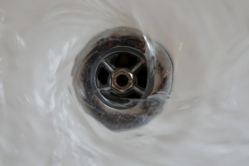 water swirling down the drain