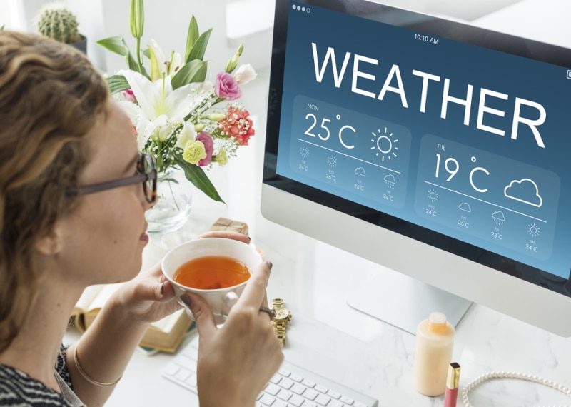 woman watching weather report