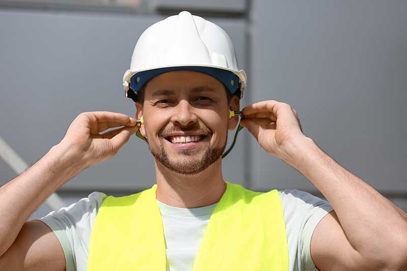 worker putting canal caps