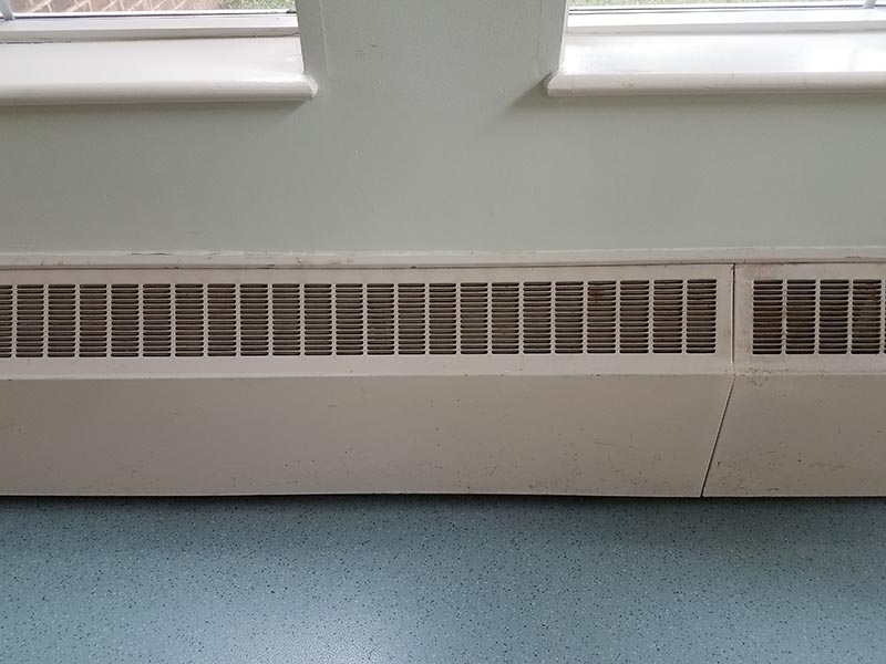 baseboard heating and blue floor