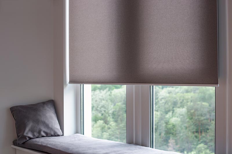Motorized roller shades