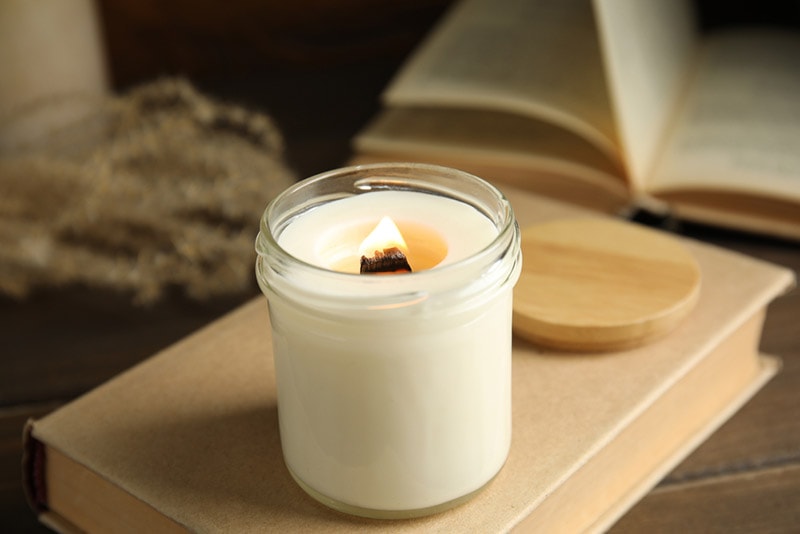 a candle with wooden wick
