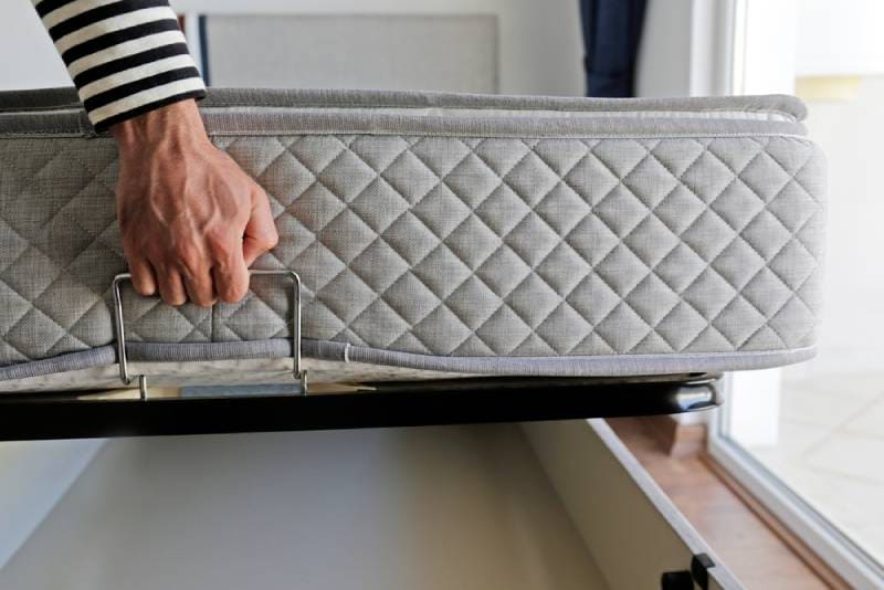 a mattress being delivered and stored