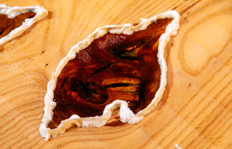 close up of drying epoxy resin on wood