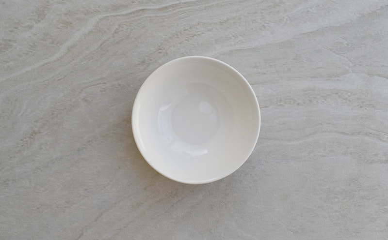 empty white bowl on kitchen counter top