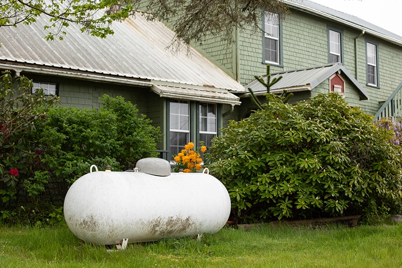 Large propane tank outside the house