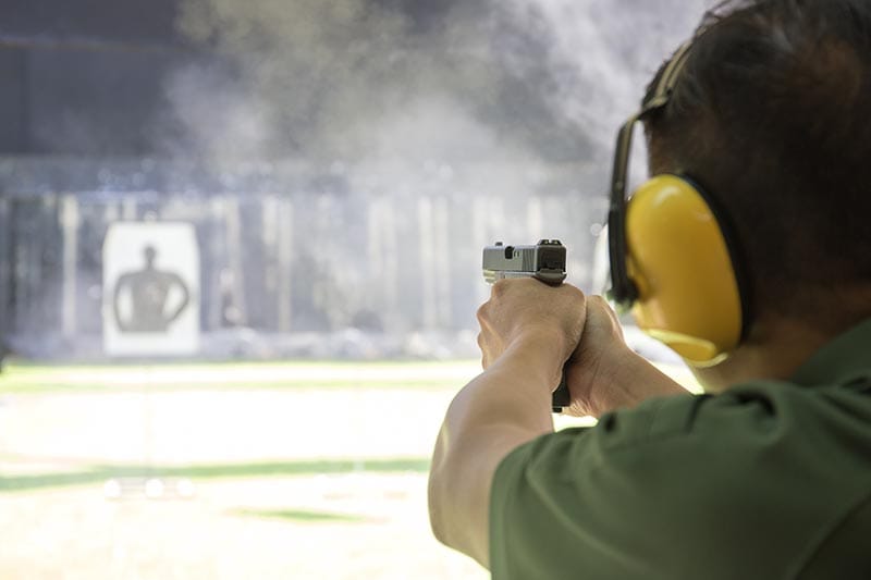 law enforcer in a gun range