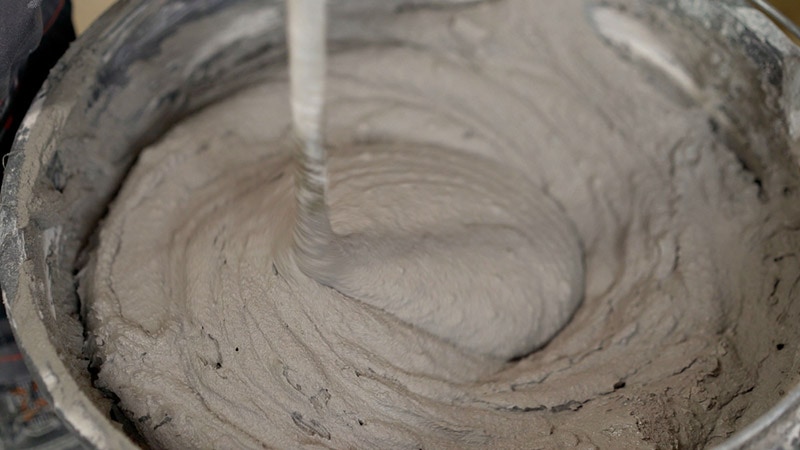 mixing mortar in a bucket