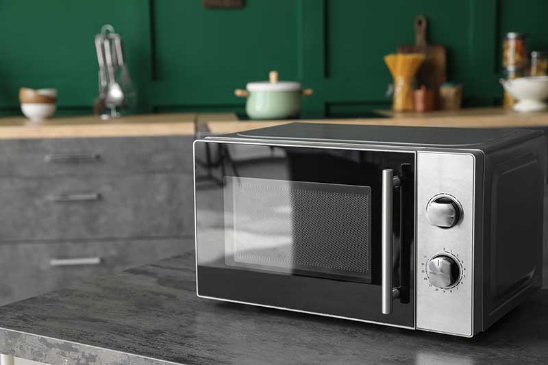 modern microwave oven on table