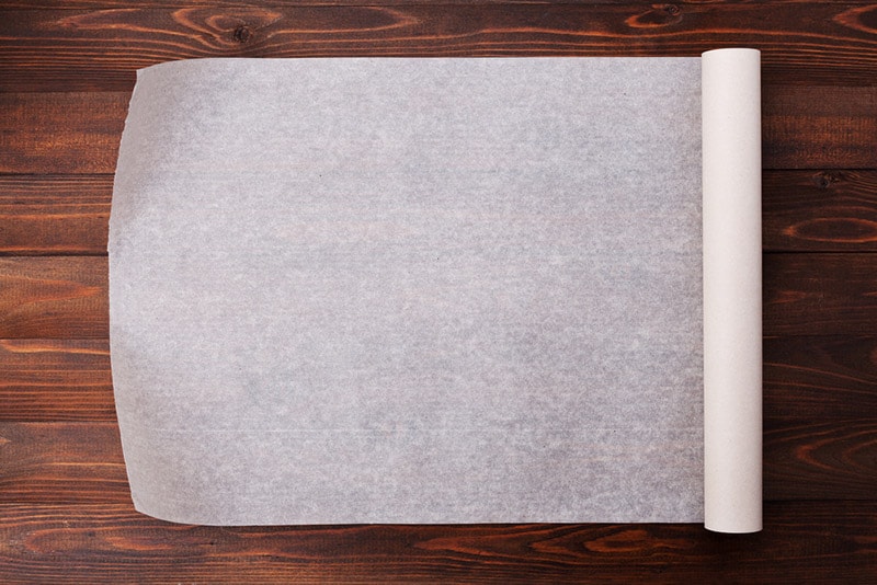 parchment paper on wooden table