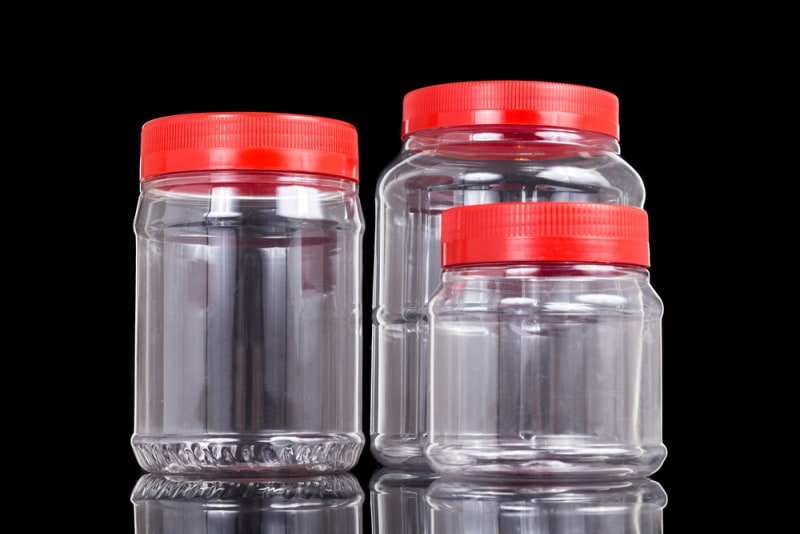 plastic jar with red cover