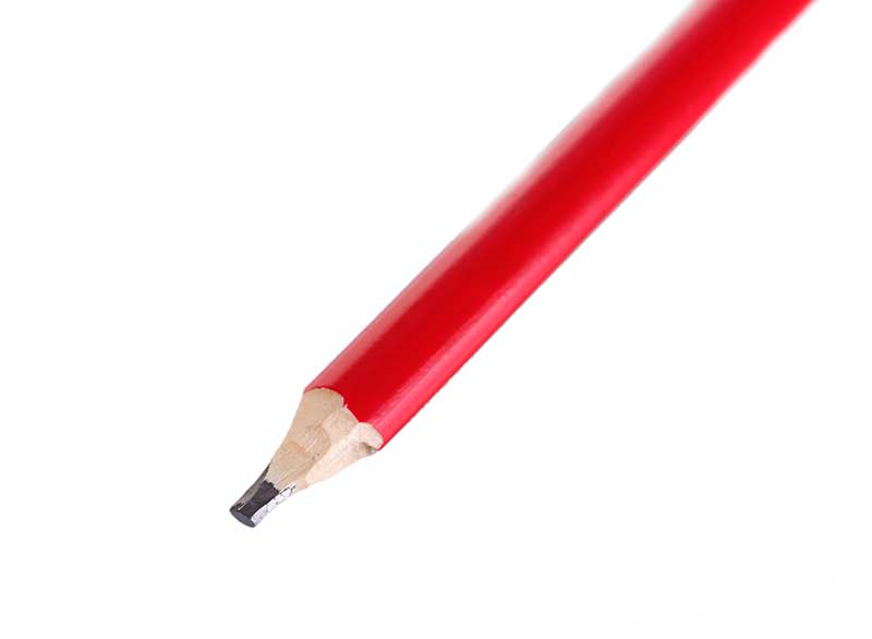 red construction carpenters pencil isolated on white