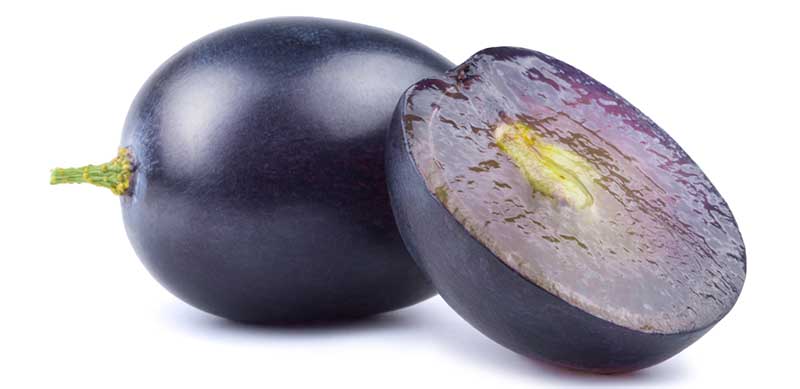 sliced dark blue grapes