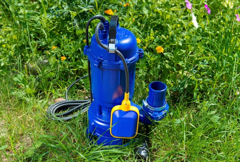 submersible pump in the grass