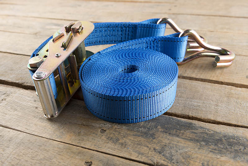 tie down strap ratchet on wood
