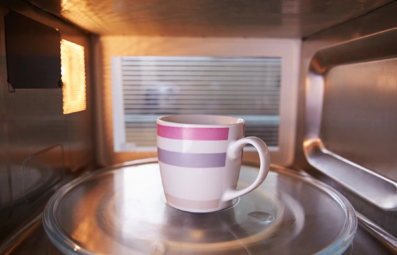 warming up a cup inside a microwave