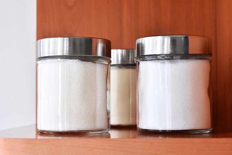 white sugar in glass jar