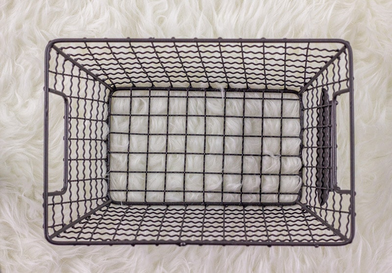 wire basket on carpet
