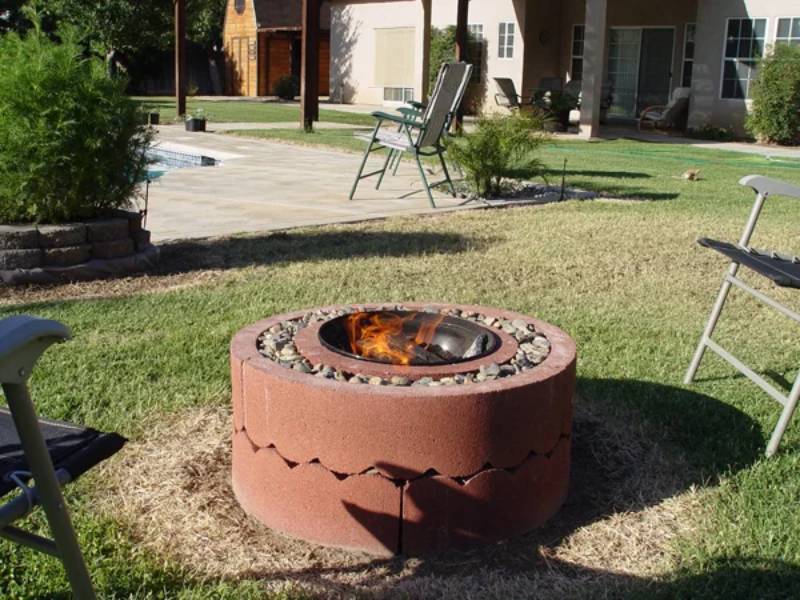 diy fire pit using concrete tree ring