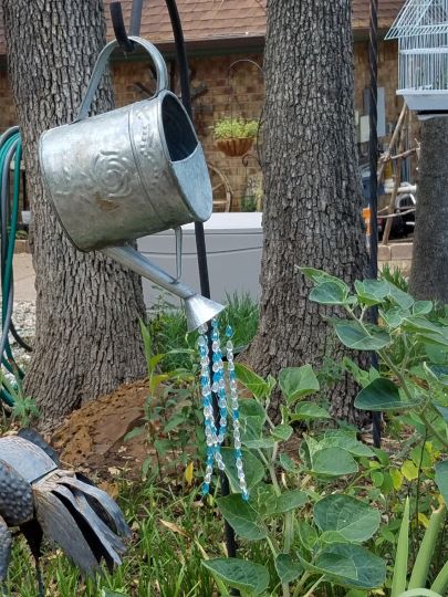 diy yard art pitcher with bling