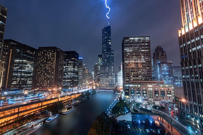 lightning hits a lightning rod of a skyscraper