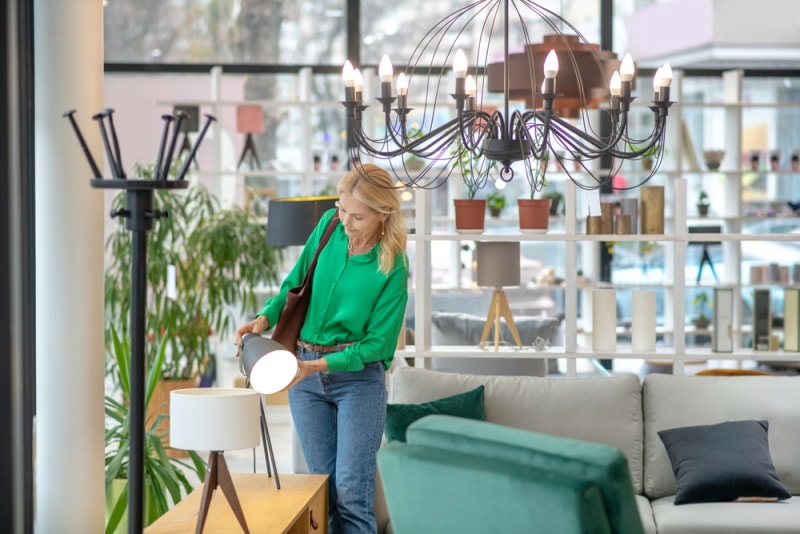 woman holding lamp