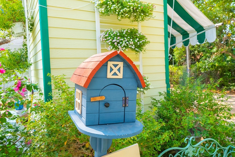 Colorful home mailbox in garden