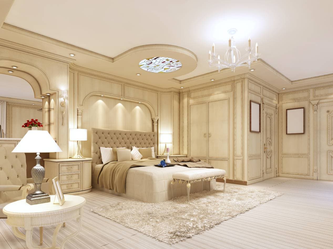 Luxurious bedroom in pastel colours in a neoclassical style