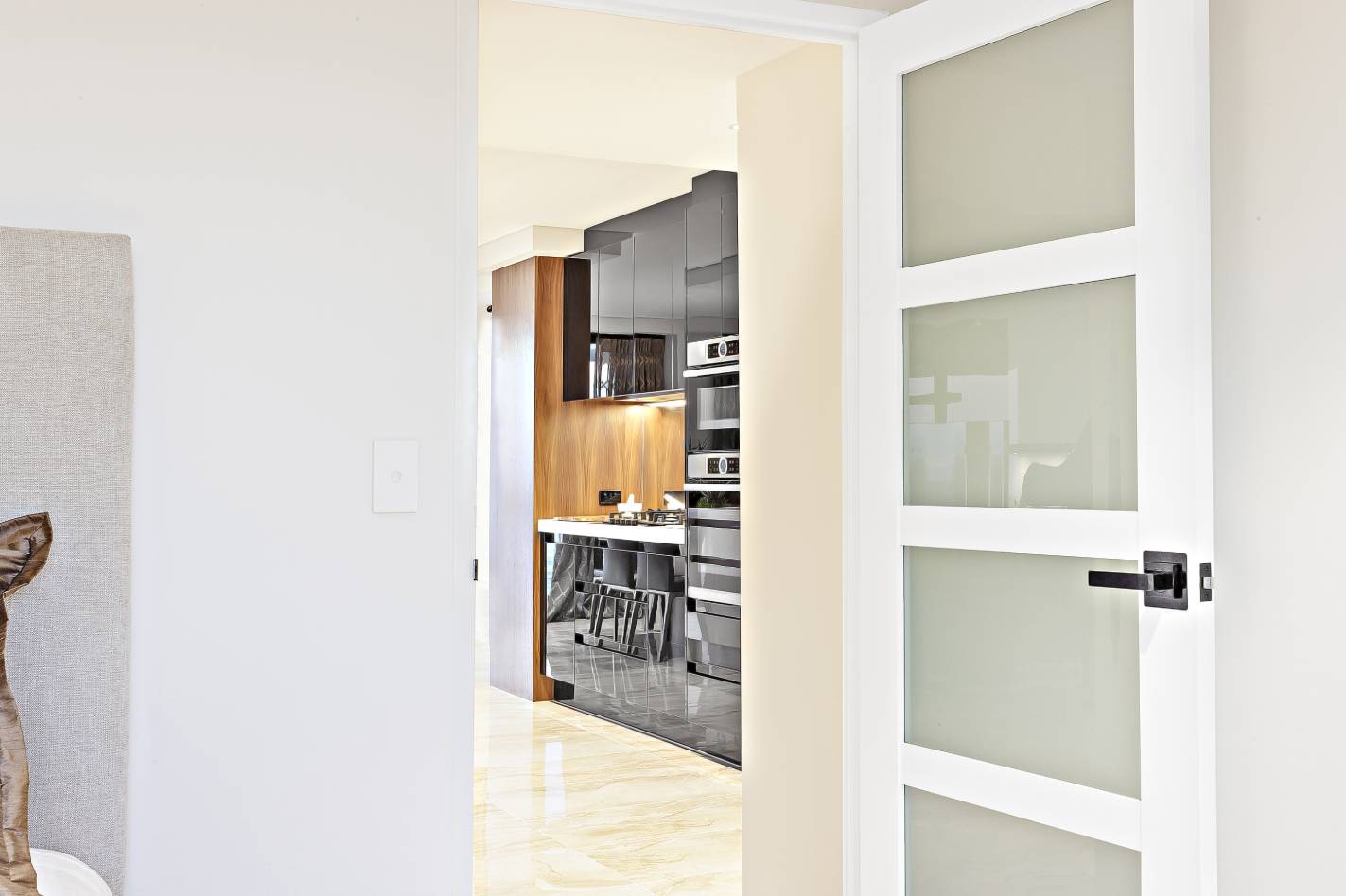 Open door entrance to a kitchen of a room