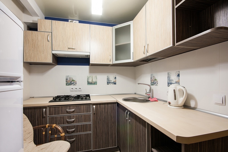 Small kitchenette in a studio, interior lighting