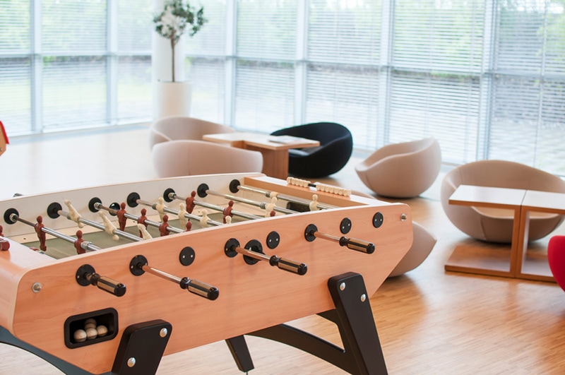 Table soccer in a large office room
